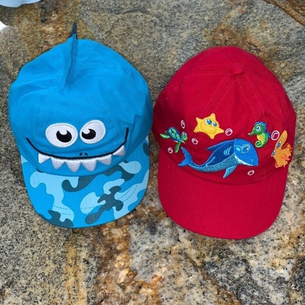 X2 baby caps. As on the pics. Approx. 17” in diameter   under the sea